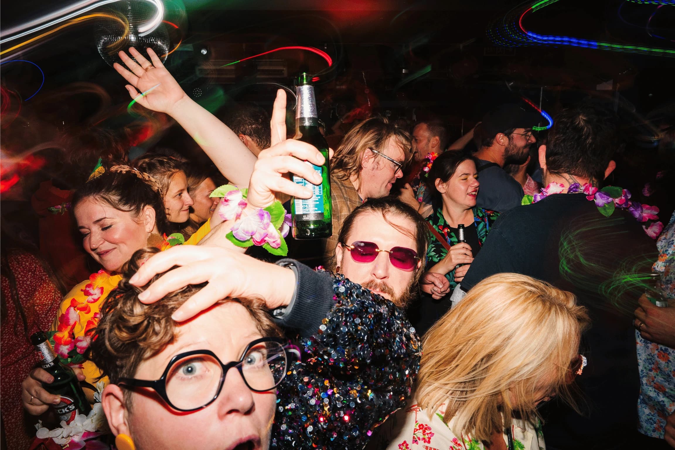 Attendees dancing together at a Way Up North after-party in Berlin