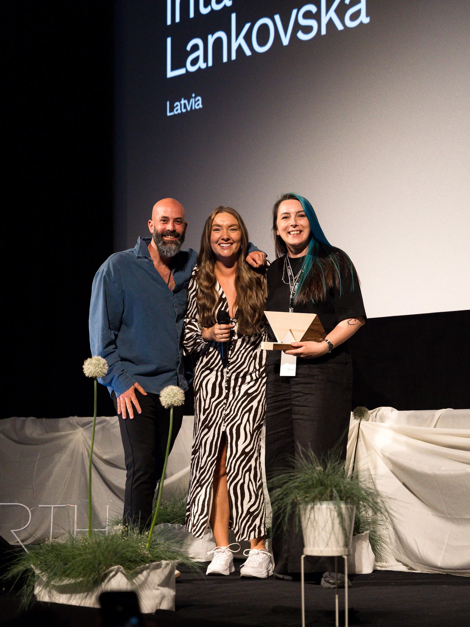 Inta Lankovska accepting Europe's Best Wedding Photographer in Vienna